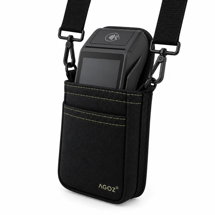 A black canvas crossbody pouch with yellow contrast stitching, holding a black Adyen POS terminal, on a white background. The pouch features the brand name 'AGOZ' in gold near the bottom and has an adjustable black strap with metal clips.