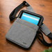 Gray Unitech RT112 crossbody carrying case with front storage pocket and padded shoulder strap