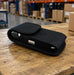 Rugged Datalogic handheld case on a warehouse workstation with the device secured inside for daily logistics workflows.