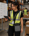 Warehouse worker wearing an AgozTech shoulder sling tablet case while using a JLT tablet in a logistics setting.