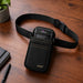 Black Agoz waist holster with Dejavoo POS terminal on tabletop