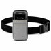 Janam waist belt case in gray shown with a Janam mobile computer secured inside the front pouch and an adjustable belt strap for stockroom movement.