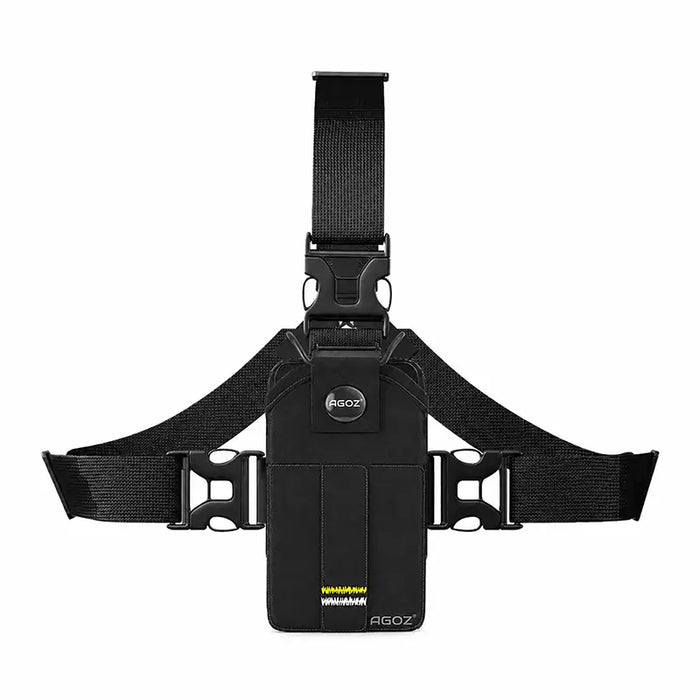 Front view: Black Agoz chest harness holster with adjustable shoulder and waist straps, quick-release buckles, and a secured Sonim enterprise communication terminal.