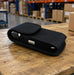 Urovo scanner inside a belt clip case on a shipping table