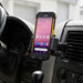 Cipherlab mobile scanner secured in an AgozTech air vent cradle mount inside a commercial vehicle dashboard.