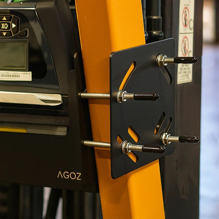 Close-up of AgozTech forklift printer mount bracket with metal rods, washers, and black mounting plate secured to forklift frame.