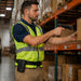 Agoz mobile terminal case worn by warehouse worker scanning boxes