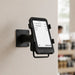 Shopify POS terminal secured in AgozTech wall mount swivel stand in retail setting