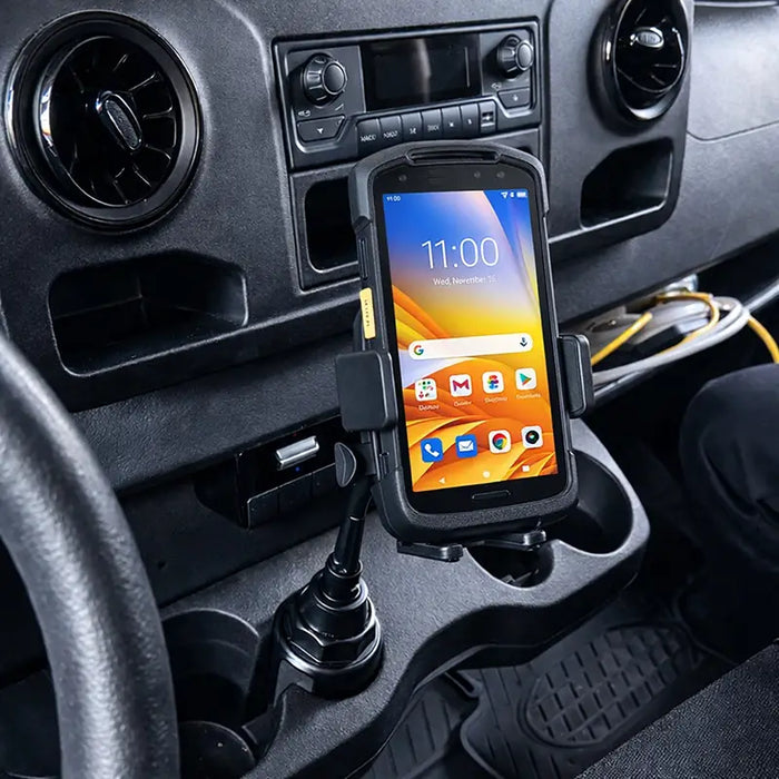Zebra TC78 mobile computer mounted in cup holder vehicle cradle inside work van